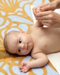 Massage of baby hand at home in the morning